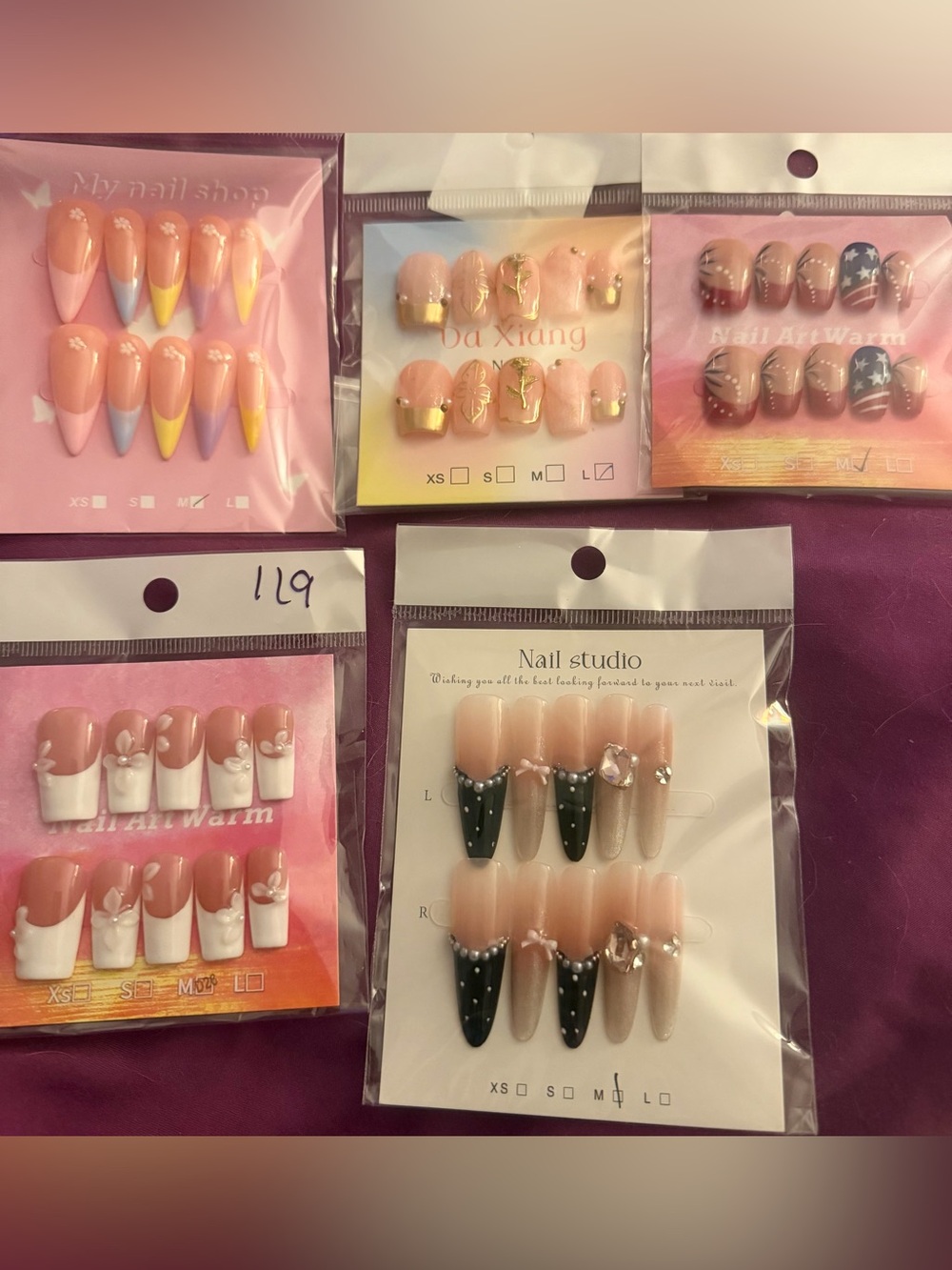 Assorted Press-On Nail Sets with Pink, Nude, Black & White Accents